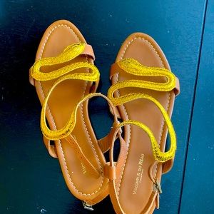 Yes, these are gold snake sandals and a show stopper.